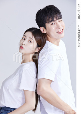 korean asian young couple standing back to back 106401846
