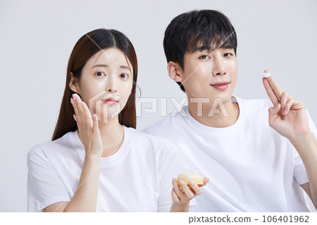 korean asian young couple with creems, cosmetics korean asian young couple with creems, cosmetics 106401962