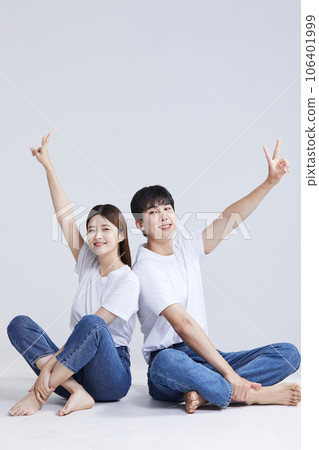 korean asian young couple with hand motions 106401999