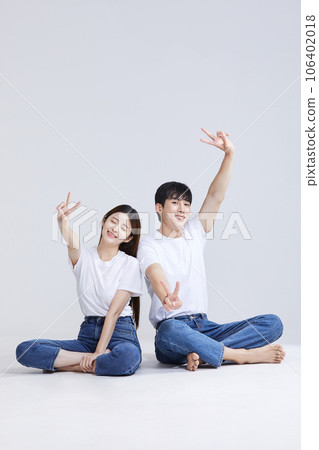 korean asian young couple with hand motions 106402018