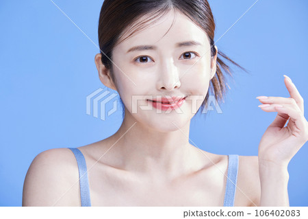 beauty concept photo of korean asain beautiful woman wearing a sleeveless top smiling beauty concept photo of korean asain beautiful woman wearing a sleeveless top smiling 106402083