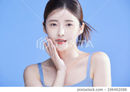 beauty concept photo of korean asain beautiful woman touching her skin 106402086