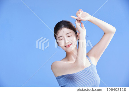 beauty concept photo of korean asain beautiful woman smiling while shielding herself from the sunlight beauty concept photo of korean asain beautiful woman smiling while shielding herself from the sunlight 106402118