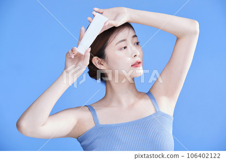 beauty concept photo of korean asain beautiful woman with a sunblock beauty concept photo of korean asain beautiful woman with a sunblock 106402122