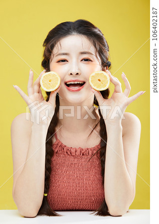 beauty concept photo of korean asain beautiful woman with lemons beauty concept photo of korean asain beautiful woman with lemons 106402187