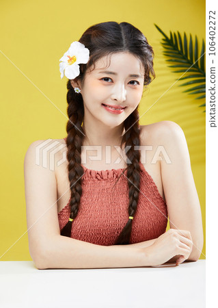beauty concept photo of korean asain beautiful woman with flower in her hair 106402272