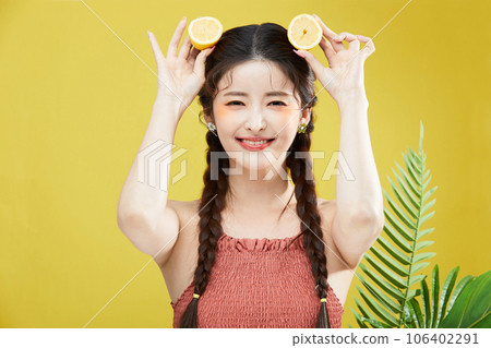beauty concept photo of korean asain beautiful woman with lemons beauty concept photo of korean asain beautiful woman with lemons 106402291