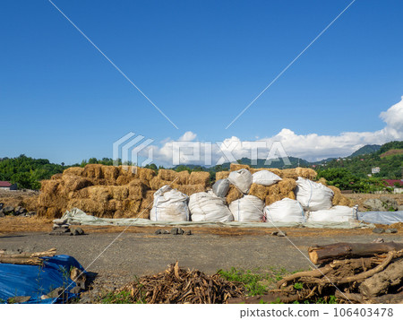 Sale of feed for livestock. Hay blocks. Lots of hay. Horse feed warehouse. Sale of feed for livestock. Hay blocks. Lots of hay. Horse feed warehouse. 106403478