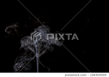 White clouds of smoke with copy space on black background 106404009