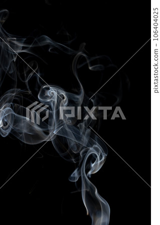 White clouds of smoke with copy space on black background 106404025