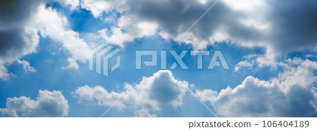 Puffy clouds. Clouds and dark blue skys background textures 106404189