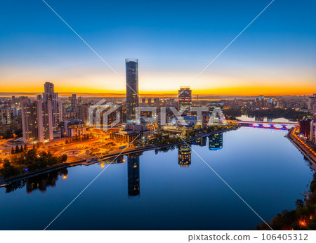 Yekaterinburg city and pond aerial panoramic view at summer or early autumn night. Night city in the early autumn or summer. 106405312