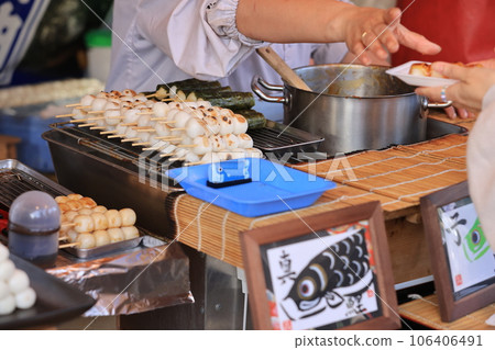 Dango is a Japanese dumpling made from rice flour mixed with uruchi rice flour and glutinous rice flour near asakusa in tokyo Dango is a Japanese dumpling made from rice flour mixed with uruchi rice flour and glutinous rice flour near asakusa in tokyo 106406491