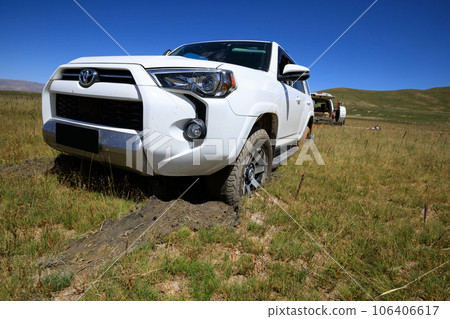 Offroad car got stuck in the mud 106406617