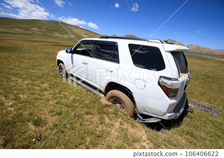 Offroad car got stuck in the mud Offroad car got stuck in the mud 106406622