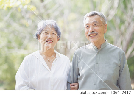 Senior couple with cuddling smile Senior couple with cuddling smile 106412417
