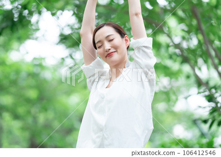 Forest bathing green women beauty Forest bathing green women beauty 106412546