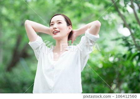 Forest bathing green women beauty Forest bathing green women beauty 106412560