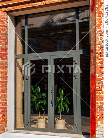 Modern cafe workspace exterior loft style red brick wall Old industrial buildings renovation Urban space Break-out areas 106412765