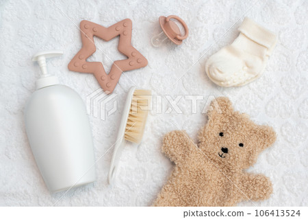 Thoughtfully arranged newborn accessories, showcasing infant essentials in top view, perfect flat lay composition 106413524