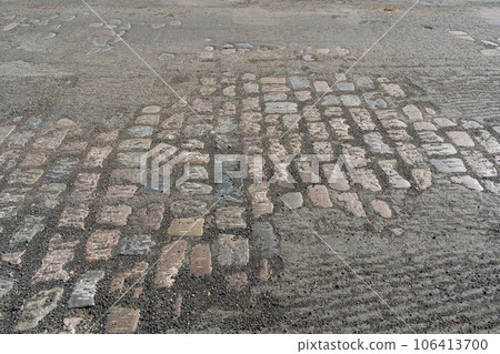 Historical Stone Pavement under Asphalt, Eternal Ancient Roads, Millennial Quality 106413700