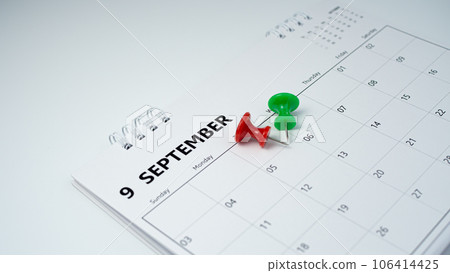 Pinning to the calendar It represents appointments, meeting reminders, planning for business meetings and travel planning concepts. 106414425