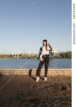 Portrait of a beautiful girl with a book. 106414448