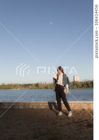 Portrait of a beautiful girl with a book. 106414456