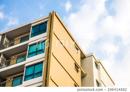 Modern condominium window building against blue sky city resident Modern condominium window building against blue sky city resident 106414882