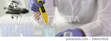 Scientist woman lab assisstant making tests in laboratory 106414926