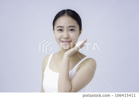 Beauty young woman washing her face with foam on her cheeks Beauty young woman washing her face with foam on her cheeks 106415411