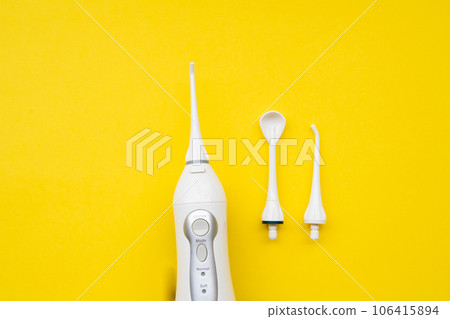 Mouth aerator on a yellow background with different nozzles. View from above Mouth aerator on a yellow background with different nozzles. View from above 106415894