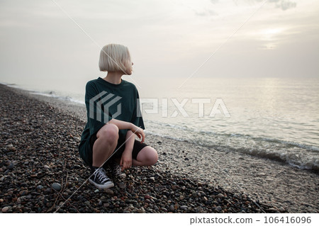 Portrait of young blond woman outdoor Portrait of young blond woman outdoor 106416096
