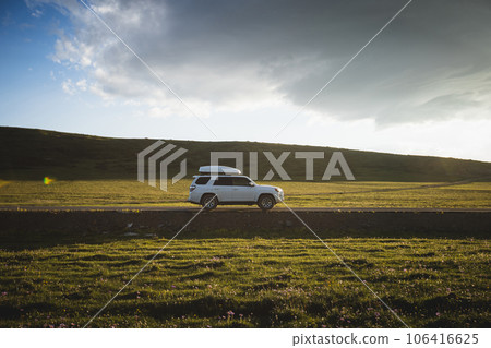 Car road trip on the high altitude mountain trail, China 106416625