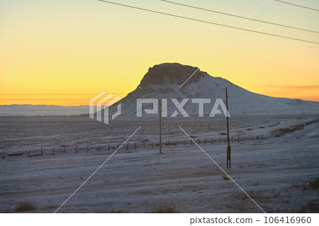 Mongolian steppe in winter during sunset. 106416960