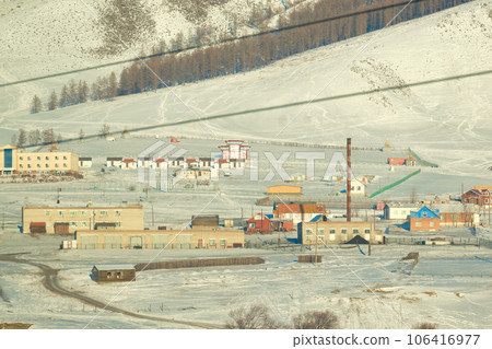 Mongolian steppe in winter during the daytime. Mongolian steppe in winter during the daytime. 106416977