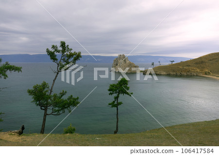 Shore of Lake Baikal. Olkhon Island, Shaman Rock Shore of Lake Baikal. Olkhon Island, Shaman Rock 106417584
