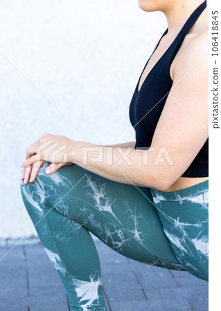 Quadriceps Focus: Fit Woman's Morning Stretch 106418845