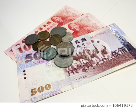 Taiwanese Yuan banknotes and coins Taiwanese Yuan banknotes and coins 106419173