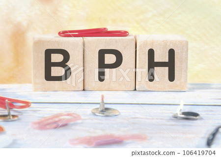 BPH Benign Prostatic Hyperplasia signs on wooden cubes on a light background BPH Benign Prostatic Hyperplasia signs on wooden cubes on a light background 106419704