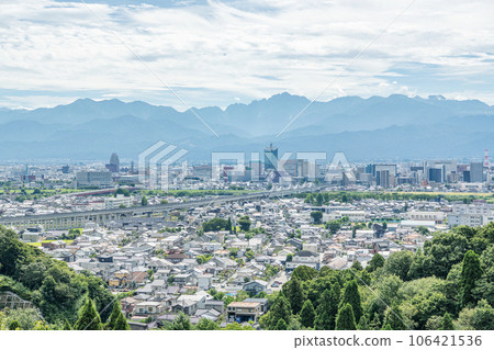 Toyama City, Toyama Prefecture Townscape around Toyama Station in summer with the Tateyama mountain range in the background 106421536