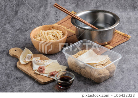 Homemade noodles and minced pork dumplings set, Asian cooking concept Homemade noodles and minced pork dumplings set, Asian cooking concept 106422328