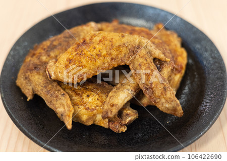 Delicious fried chicken wings 106422690