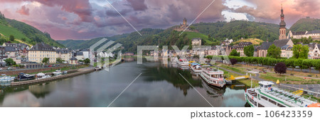 Scenic view of the old fabulous German city of Cochem at dawn. Germany. Scenic view of the old fabulous German city of Cochem at dawn. Germany. 106423359
