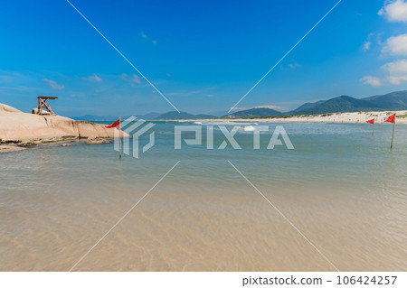 Beach with rocks, sand and ocean. Holiday beach in Brazil, Florianopolis 106424257