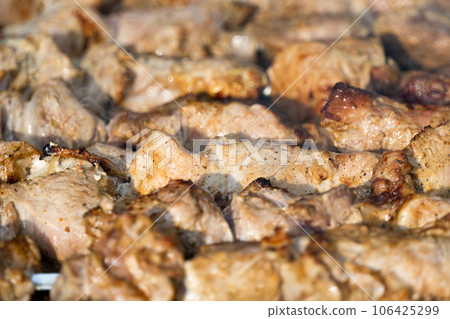 shish kebab on a skewer close-up shish kebab on a skewer close-up 106425299