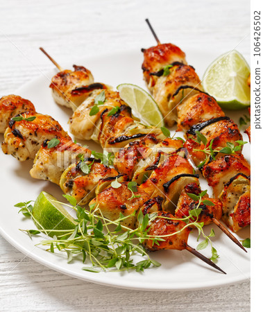 chicken souvlaki with thyme and lime on plate chicken souvlaki with thyme and lime on plate 106426502