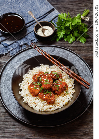 Baked Honey Sesame Chicken with brown rice 106426505