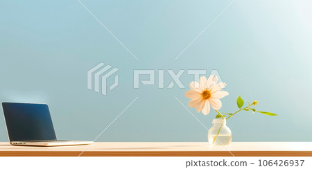 Minimalistic office desk with a laptop and one flower on the table. Generative AI 106426937