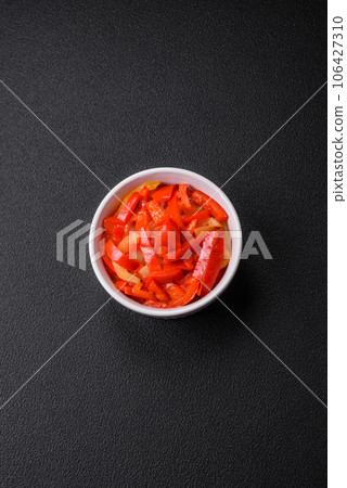 Delicious fresh saute sweet bell pepper slices with onion, salt, spices and herbs 106427310